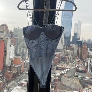 Blue sparkly body suit